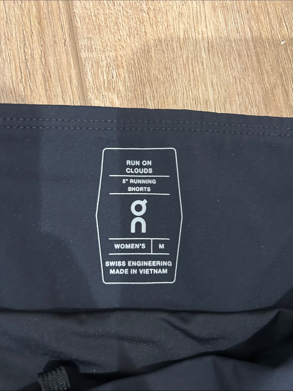 On Running | Women’s Black Athletic Shorts | Reflective Logo - Picture 2 of 5